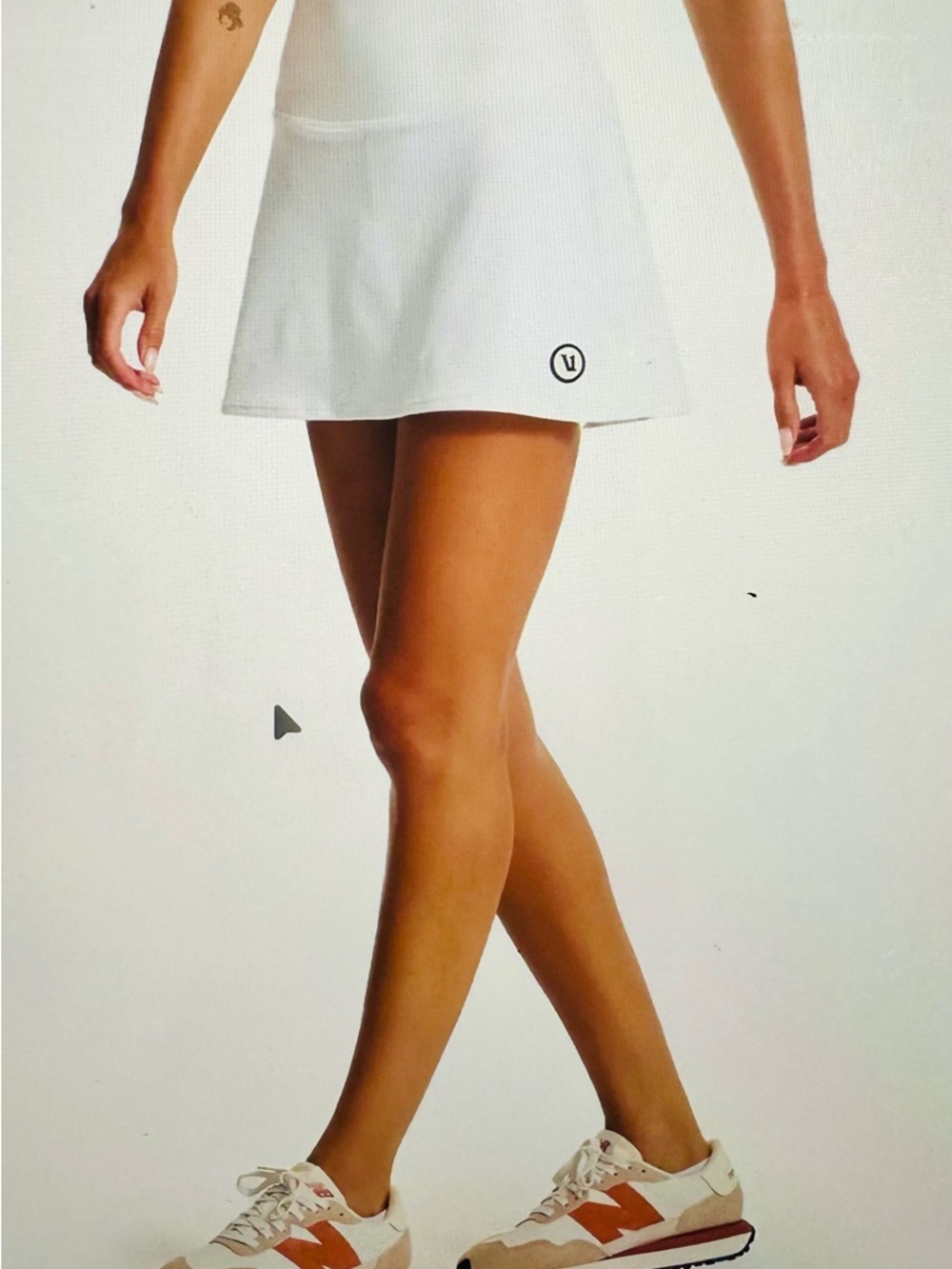 Vuori White Athletic Mini Skirt with Subtle Logo